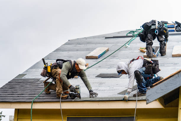 Professional Roofing technician working in East Troy, WI